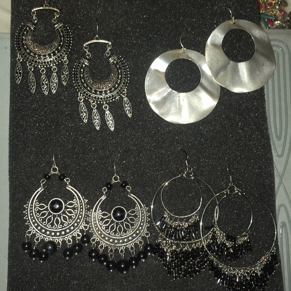 4 pair of black and silver dangle earrings